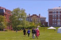 Ã¢â¬Å½April Ã¢â¬Å½23 Ã¢â¬Å½2015 Middletown Connecticut An ethnic family walks across Wesleyan University campus with tents up for